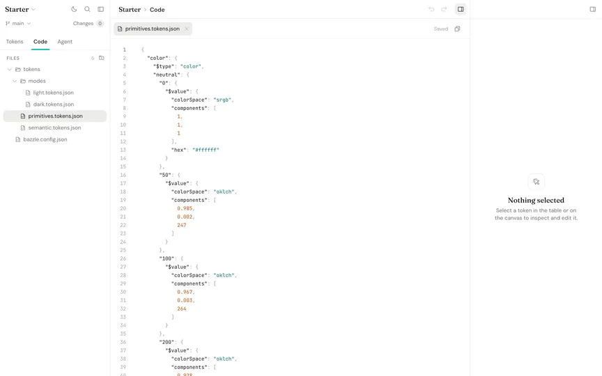 Code view editing primitives.tokens.json, with the project’s token files listed beside it